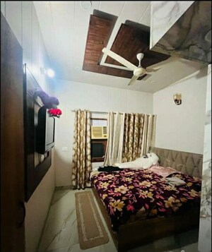 Bedroom in 2 BHK Builder Floor at Dhakoli – for Sale