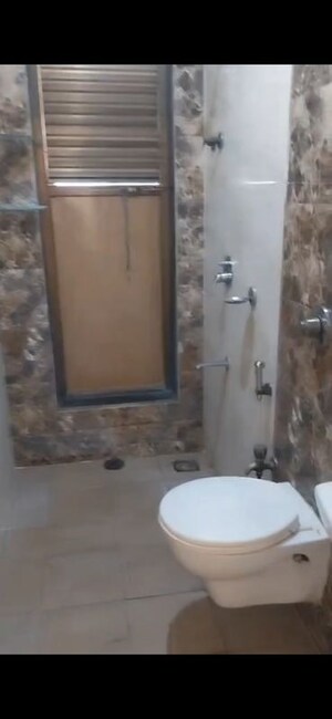 Bathroom in 2 BHK Apartment at Sethia Link View, Goregaon West – for Rent