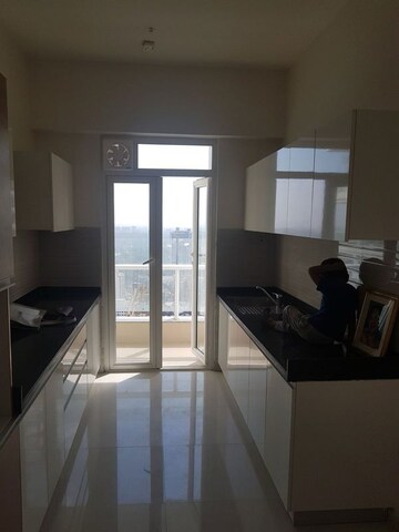 Kitchen in 3 BHK Apartment at Omkar Alta Monte, Malad East – for Sale