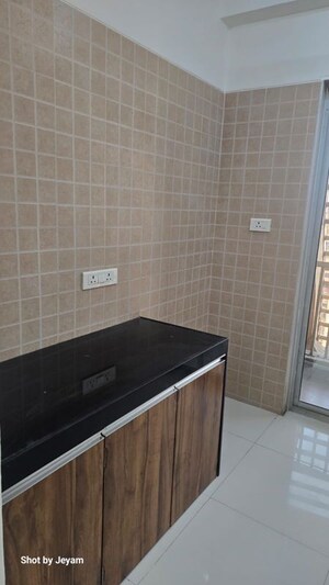 Kitchen in 2 BHK Apartment at Madhav Palacia, Ghodbunder Road – for Sale