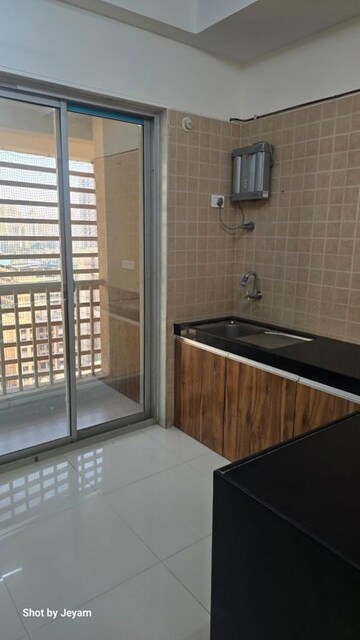 Kitchen in 2 BHK Apartment at Madhav Palacia, Ghodbunder Road – for Sale