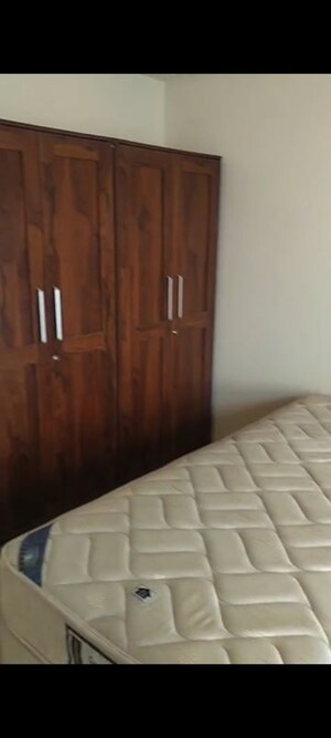 Bedroom in 2 BHK Apartment at Chandak Cornerstone, Worli – for Rent