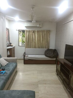 Living Room in 2 BHK Apartment at Mahim West – for Sale