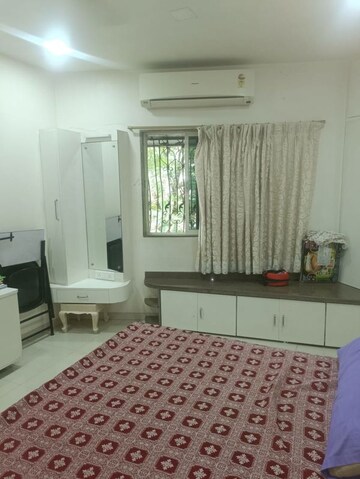 Bedroom in 2 BHK Apartment at Mahim West – for Sale