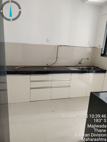Kitchen in 2 BHK Apartment at Lodha Luxuria, Majiwada – for Sale
