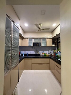 Kitchen in 3 BHK Apartment at Soham Tropical Lagoon, Ghodbunder Road – for Rent