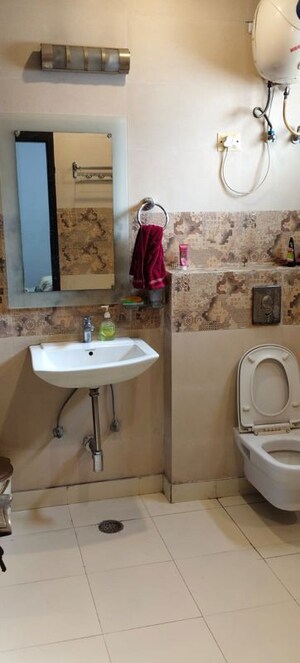 Bathroom in 4 BHK Builder Floor at Maya Homes, Indrapuram – for Rent