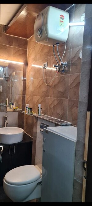 Bathroom in 3 BHK Apartment at DLF The Skycourt, Sector 86 – for Rent