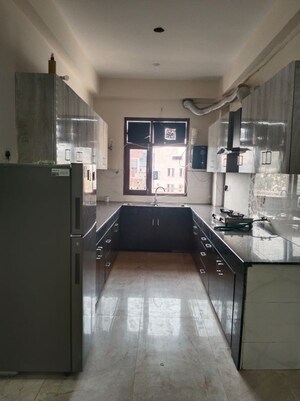 Kitchen in 3 BHK Apartment at Unitech Uniworld Gardens 2, Sector 47 – for Rent