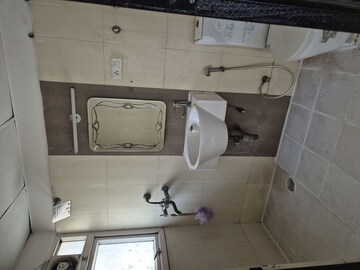 Bathroom in 3 BHK Apartment at Aditya Celebrity Homes, Sector 76 – for Rent