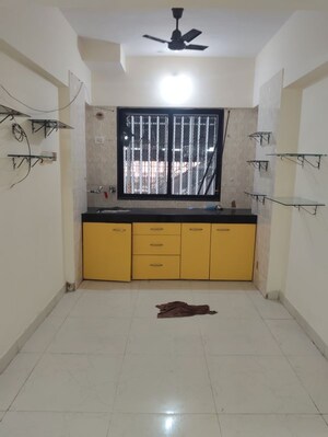 Kitchen in 3 BHK Apartment at Chauhan Avenue, Goregaon West – for Rent