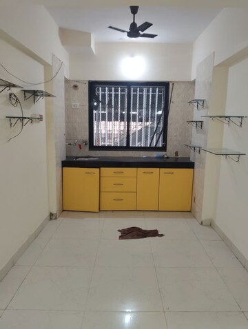 Kitchen in 3 BHK Apartment at Chauhan Avenue, Goregaon West – for Rent