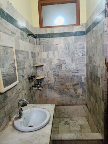 Bathroom in 1 RK Independent House at RWA Apartments Sector 19, Sector 19 – for Rent