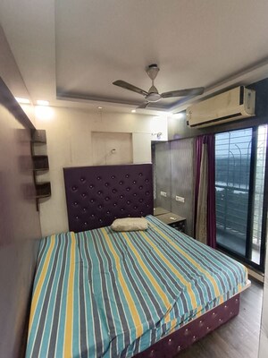 Bedroom in 1.5 BHK Apartment at Juhi Lawns, Seawoods – for Rent