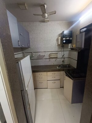 Kitchen in 1.5 BHK Apartment at Juhi Lawns, Seawoods – for Rent