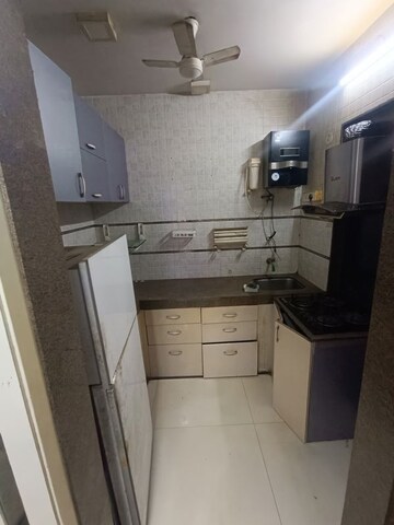 Kitchen in 1.5 BHK Apartment at Juhi Lawns, Seawoods – for Rent