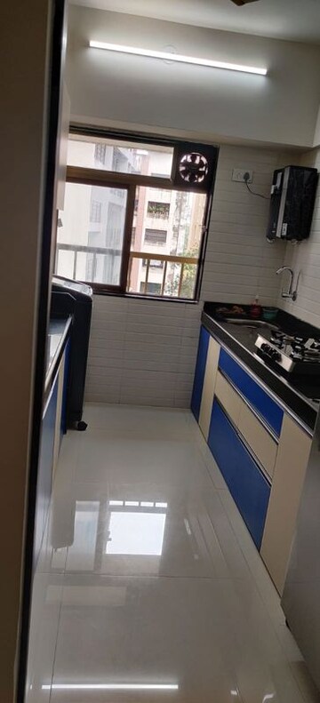 Kitchen in 2 BHK Apartment at Eversmile CHS, Andheri West – for Rent