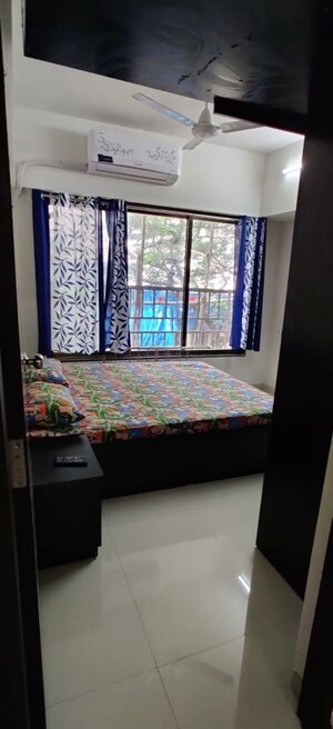 Bedroom in 2 BHK Apartment at Eversmile CHS, Andheri West – for Rent