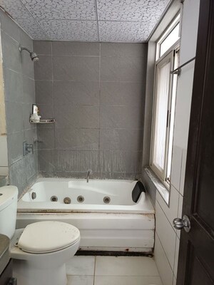 Bathroom in 3 BHK Apartment at Marvel Isola, Mohammadwadi – for Rent