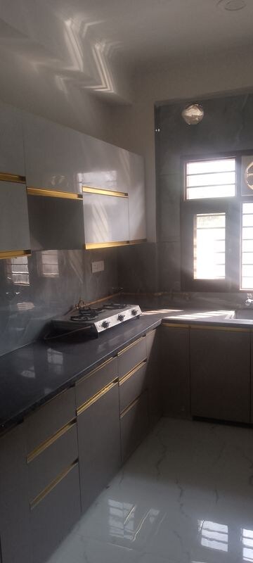 Kitchen in 2 BHK Builder Floor at Arun Yamuna Enclave, Sector 30 – for Rent