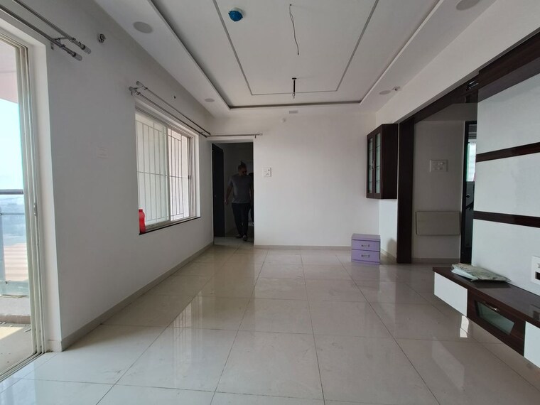 Living Room, paranjape-abhiruchi-parisar 3 Bedroom 948 Sq.Ft. Apartment In Dhayari Pune 9915908