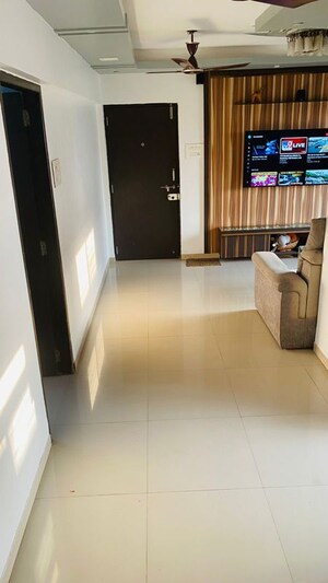 Living Room in 1 BHK Apartment at Lokhandwala Whispering Palms XXclusives, Kandivali East – for Rent