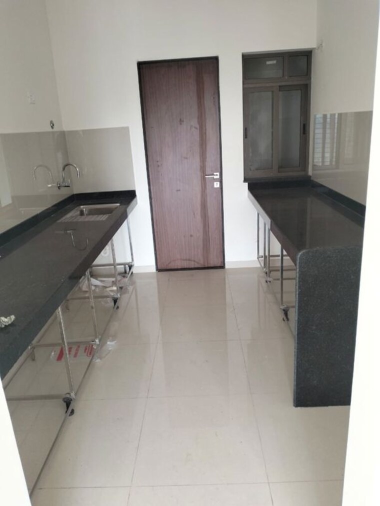 Kitchen, skyi-songbirds 3 Bedroom 1500 Sq.Ft. Apartment In Bavdhan Pune 9915904