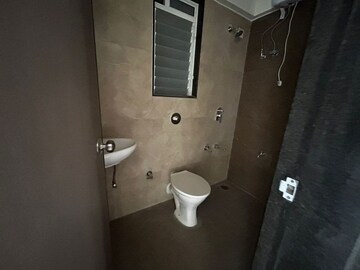 Bathroom in 2 BHK Apartment at Metropolis Rivera, Kasarvadavali – for Rent