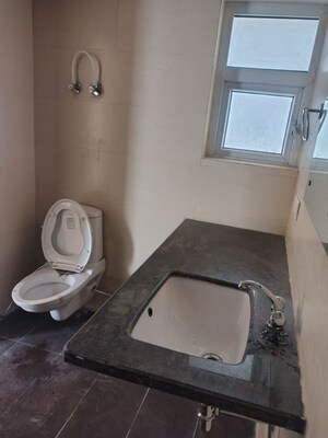 Bathroom in 3 BHK Apartment at Ansal Crown Heights, Sector 80 – for Rent