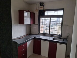 Kitchen in 2 BHK Apartment at Kalpataru Immensa, Kolshet Road – for Rent