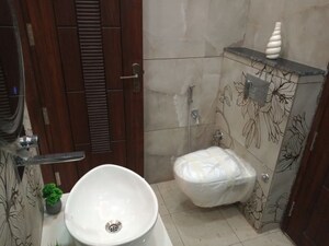 Bathroom in 4 BHK Builder Floor at Puri Aman Vilas, Sector 89 – for Sale