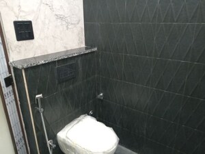 Bathroom in 4 BHK Builder Floor at Puri Aman Vilas, Sector 89 – for Sale