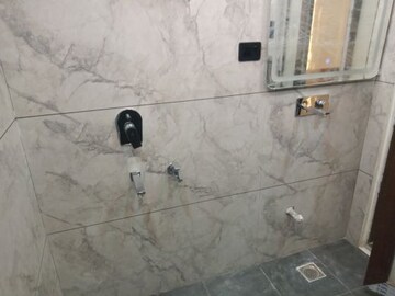 Bathroom in 4 BHK Builder Floor at Puri Aman Vilas, Sector 89 – for Sale