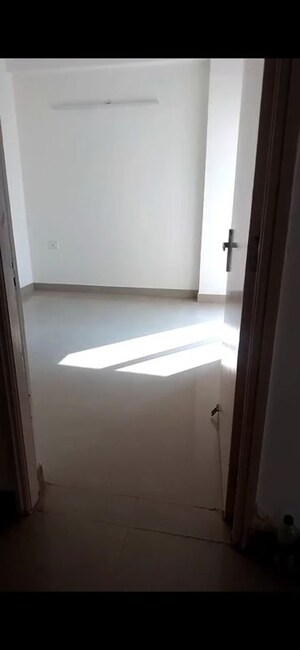 Room in 2 BHK Apartment at VIctoryone Amara, Sector 16 Greater Noida – for Rent