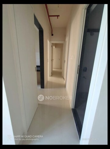Living Room in 2 BHK Apartment at Rustomjee Azziano Wing K, Thane West – for Sale