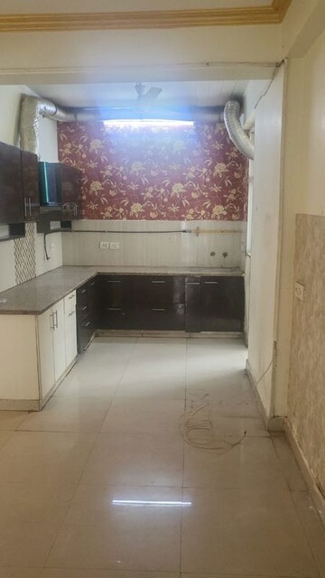 Kitchen in 2 BHK Apartment at Amrapali Zodiac, Sector 120 – for Rent