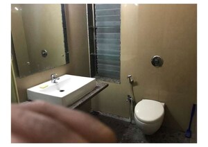 Bathroom in 3 BHK Apartment at Satellite Tower, Goregaon East – for Rent