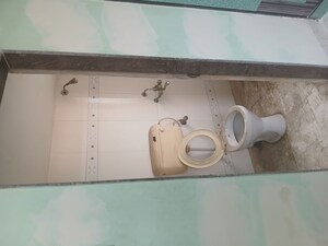 Bathroom in 1 BHK Apartment at Swastik Palms CHS, Brahmand – for Rent