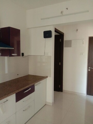 Kitchen in 1 BHK Apartment at Puranik Rumah Bali, Ghodbunder Road – for Rent