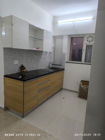 Kitchen in 2 BHK Apartment at Omkar Signet, Malad East – for Rent