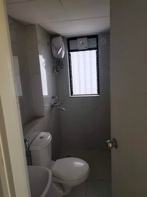 Bathroom in 1 BHK Apartment at Runwal Gardens, Dombivli East – for Sale