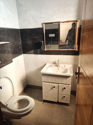 Bathroom in 4 BHK Builder Floor at Green Fields Colony – for Rent
