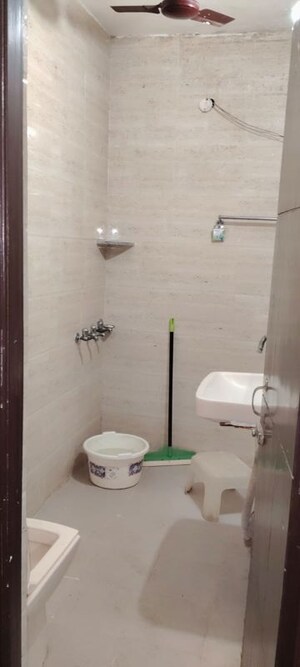 Bathroom in 4 BHK Builder Floor at Green Fields Colony – for Rent