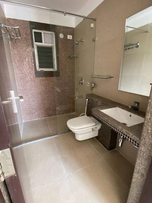 Bathroom in 3 BHK Apartment at Nyati Wind Chimes, Undri – for Rent