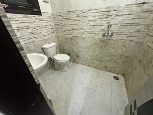 Bathroom in 2 BHK Apartment at Rajul Augusta, Vaishali Nagar – for Rent