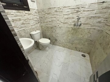 Bathroom in 2 BHK Apartment at Rajul Augusta, Vaishali Nagar – for Rent