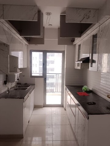 Kitchen in 2 BHK Apartment at Gulshan Bellina, Sector 16 Greater Noida – for Rent