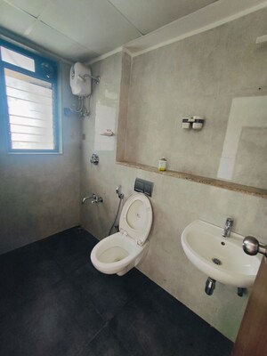 Bathroom in 2 BHK Apartment at Runwal Gardens, Dombivli East – for Sale