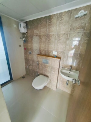 Bathroom in 2 BHK Apartment at Runwal Gardens, Dombivli East – for Sale