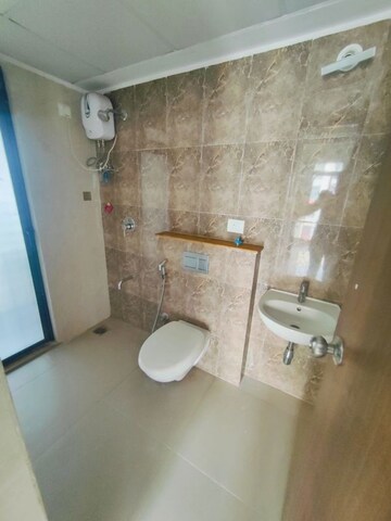 Bathroom in 2 BHK Apartment at Runwal Gardens, Dombivli East – for Sale